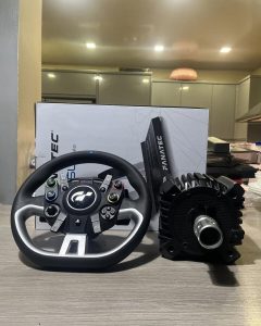 sim racing setup from Fanatec, including the CSL Elite Pedals V2, a wheel base, and a steering wheel.